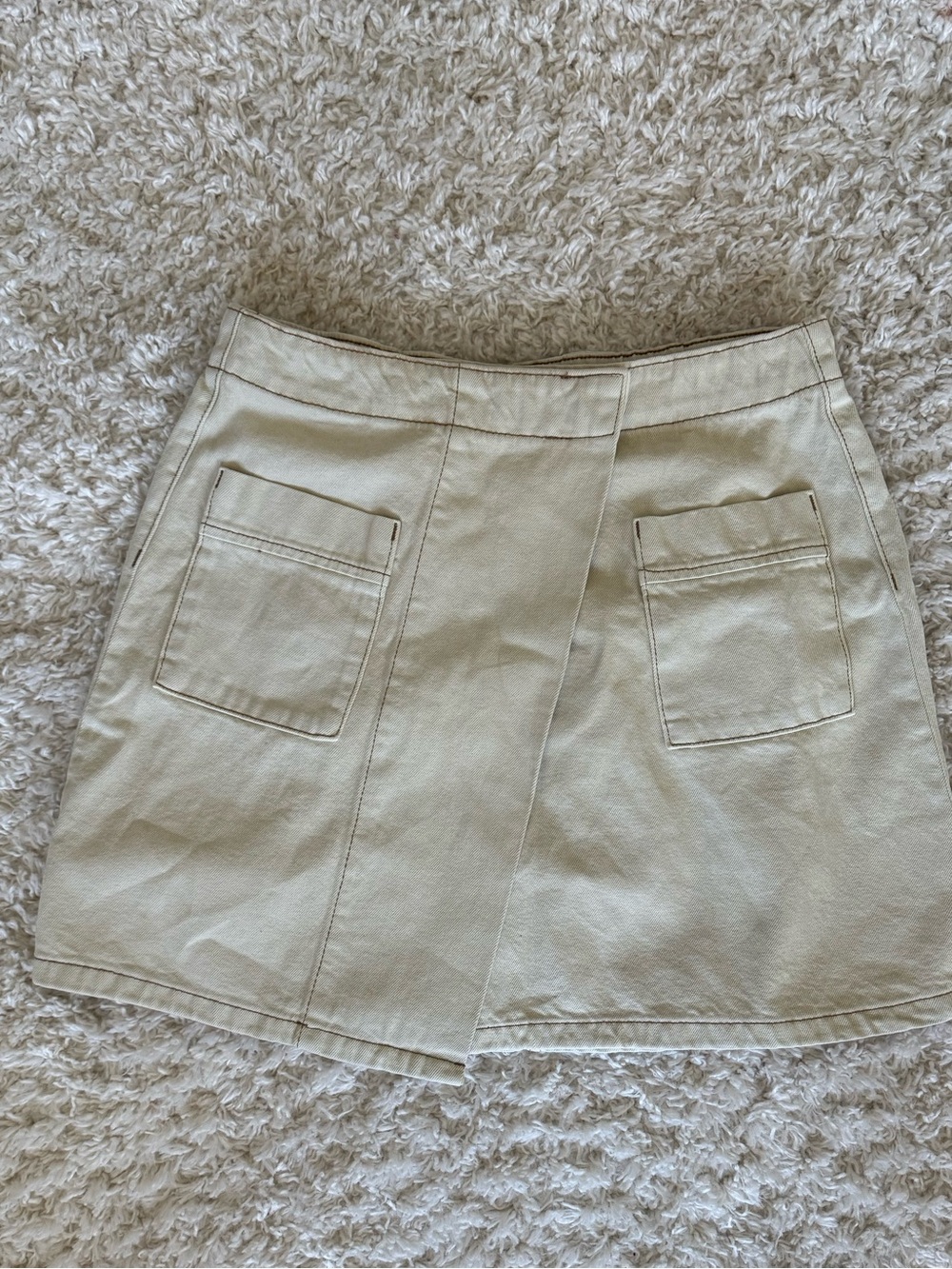 Beige Mini cream denim skirt with Front Patch Pockets